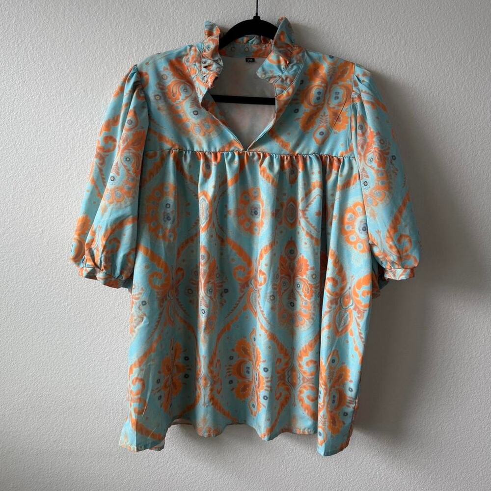 Team and orange plus size top